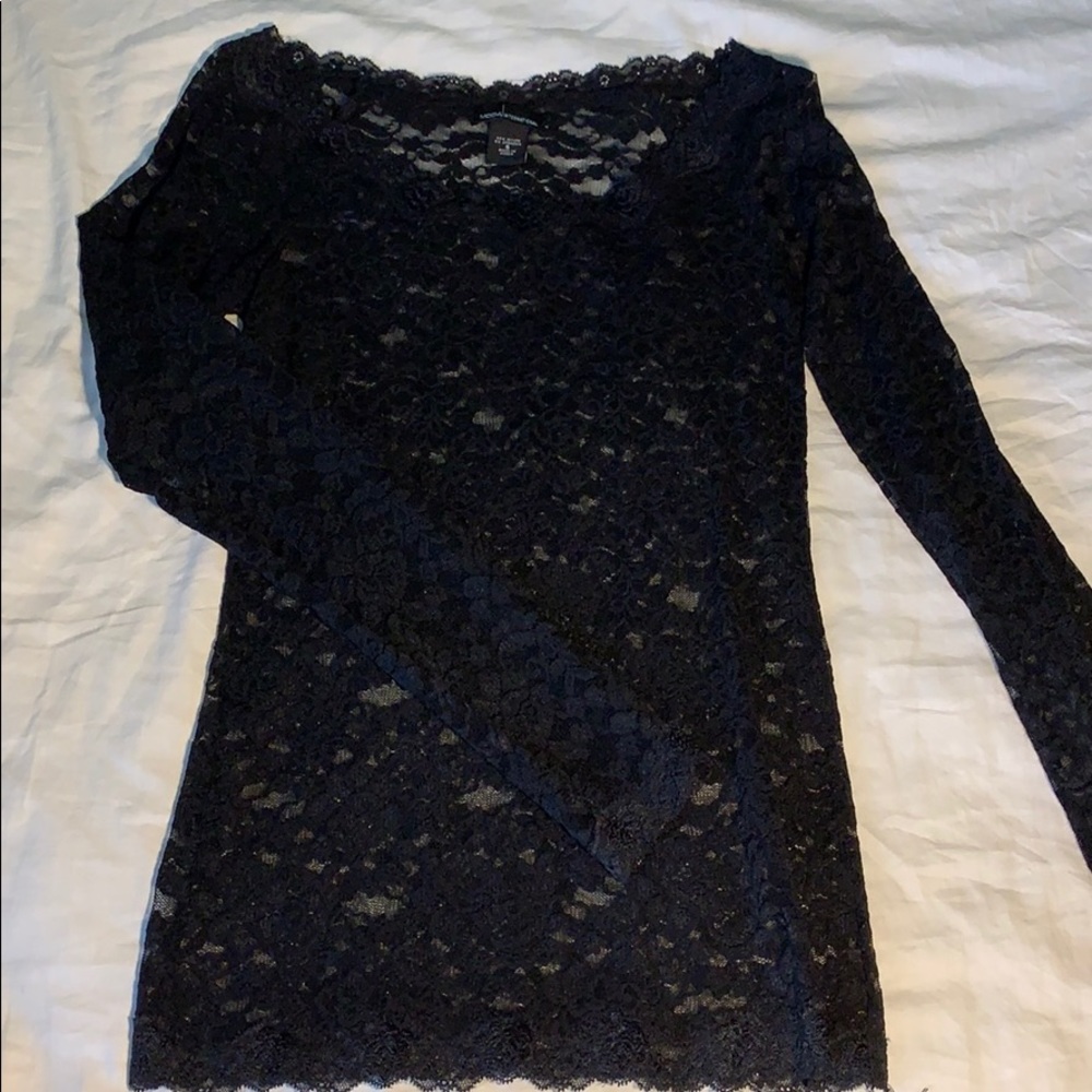 Lace, fitted, black top.